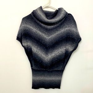 Sweater Vest. Black gray n white. Fits at waist.